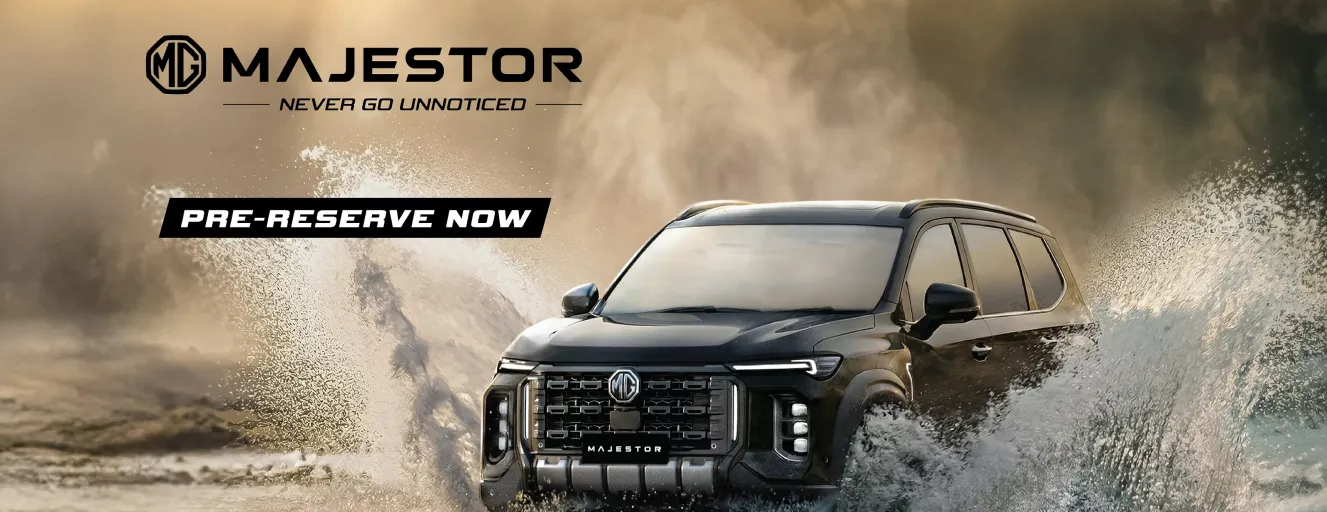 A black MG majester SUV driving through deep water, creating a large splash, with "G-Force" text in the background.